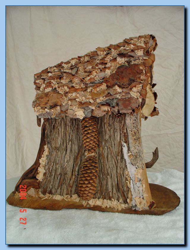2-19 bird house with pine cones-archive